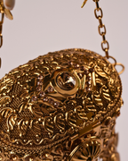 Golden Potli Bag with Stone Work & Decorative Hanging Details