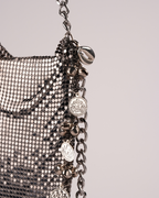 Silver Metallic Chain Sling Bag with Traditional Charms