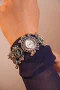 Silver Navratri Watch with Ethnic elements and Green Stone